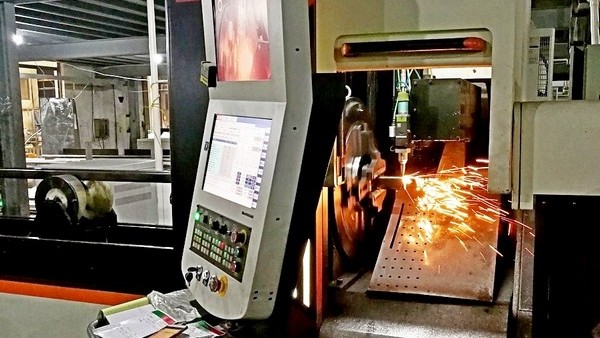 CNC laser pipe cutting in action