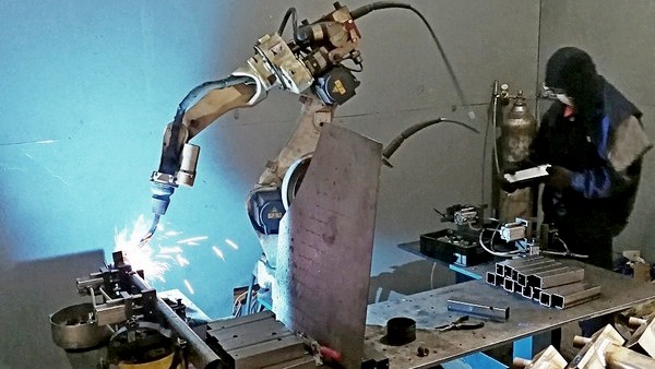 CNC laser pipe cutting in action